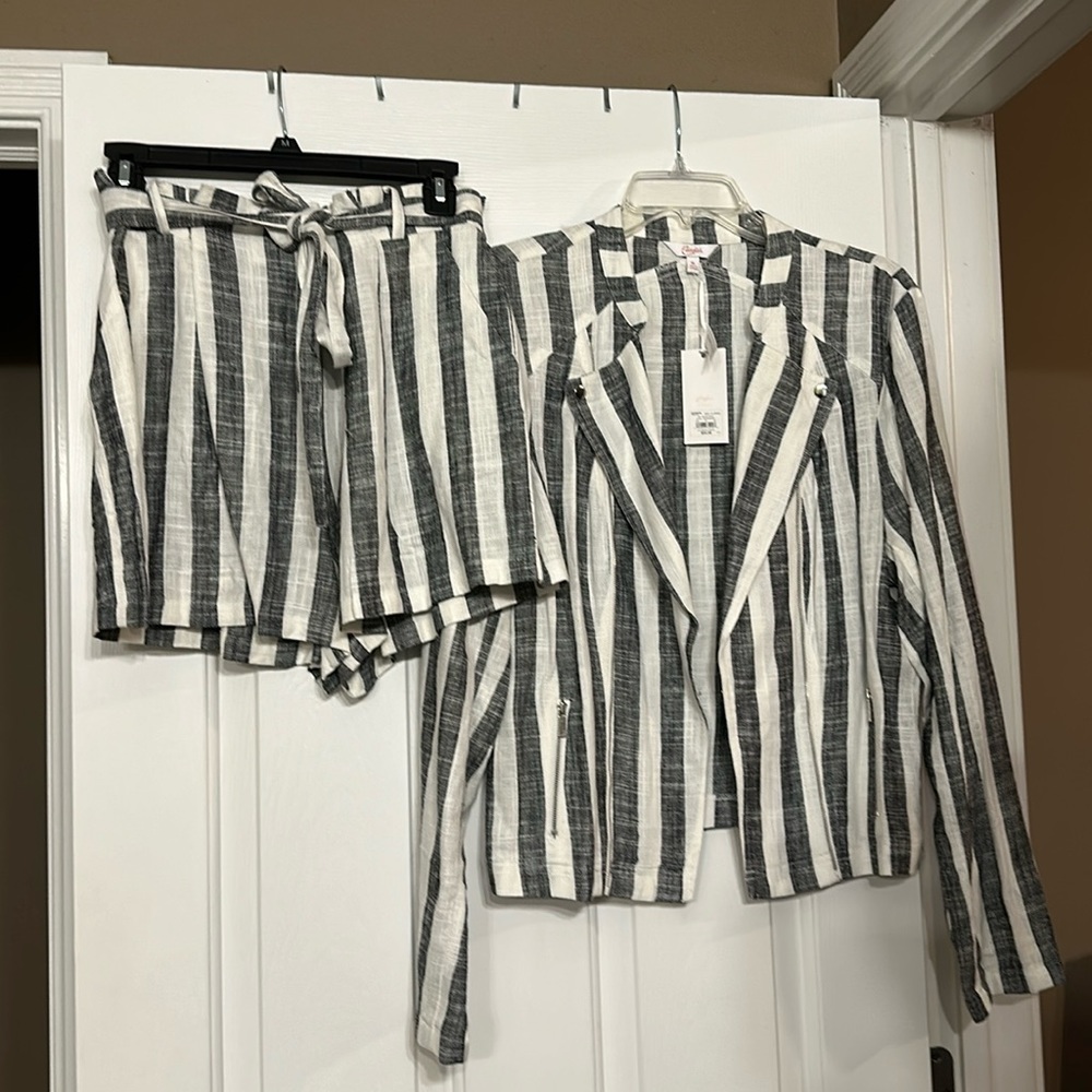 Brand new with tags, black and white stripe shorts large and jacket X-Large